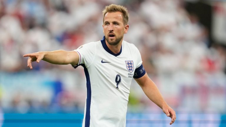 England's Harry Kane points out during a Group C match between Denmark and England at the Euro 2024 soccer tournament in Frankfurt, Germany, Thursday, June 20, 2024. (Michael Probst/AP) 