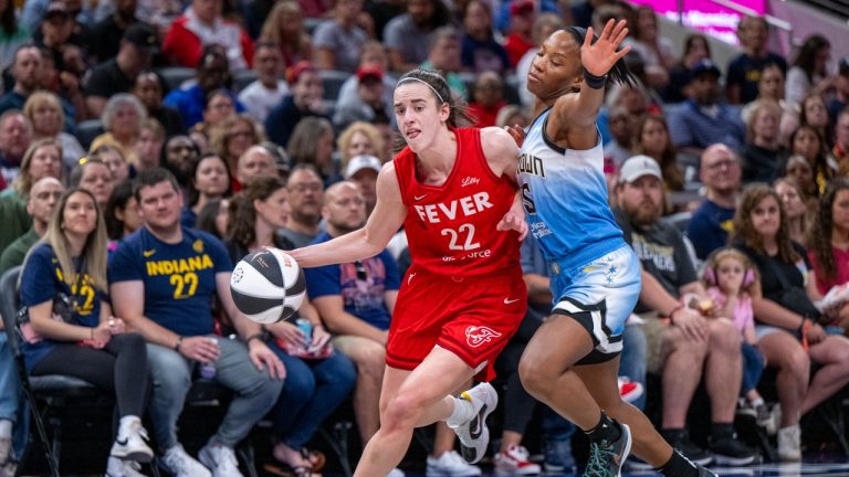 Indiana Fever guard Caitlin Clark (22) makes contact with Chicago Sky guard Lindsay Allen (15) during a WNBA basketball game Saturday, June 1, 2024, in Indianapolis. (AP/Doug McSchooler)