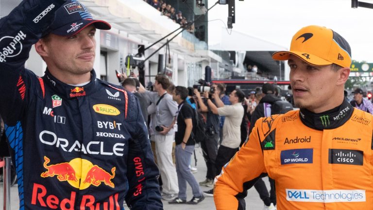 Red Bull Racing driver Max Verstappen, left, and McLaren driver Lando Norris wave to the crowd following qualifying session at the Canadian Grand Prix Saturday. (CP/Christinne Muschi)