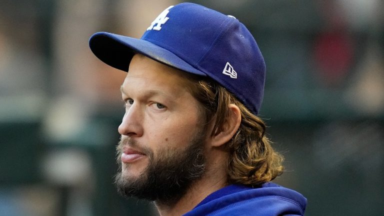 Los Angeles Dodgers starting pitcher Clayton Kershaw in the dugout prior to Game 3 of the NL Division Series against the Arizona Diamondbacks, Oct. 11, 2023. (AP Photo/Ross D. Franklin)