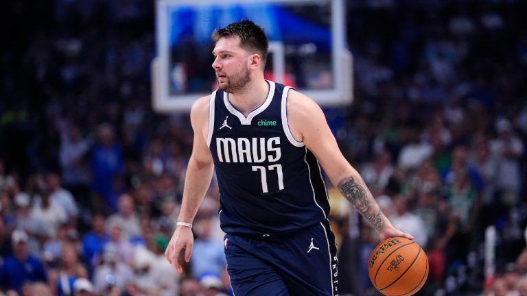 Dallas Mavericks guard Luka Doncic (77) bring the ball up court against the Boston Celtics during the first half in Game 4 of the NBA basketball finals, Friday, June 14, 2024, in Dallas. (Julio Cortez/AP)