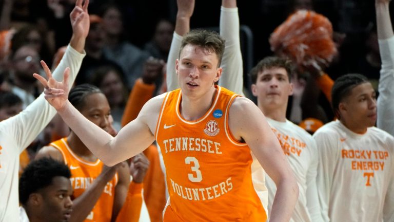 Tennessee guard Dalton Knecht reacts after a three-point basket during  the Elite Eight game in the NCAA Tournament, March 31, 2024. (AP Photo/Paul Sancya)