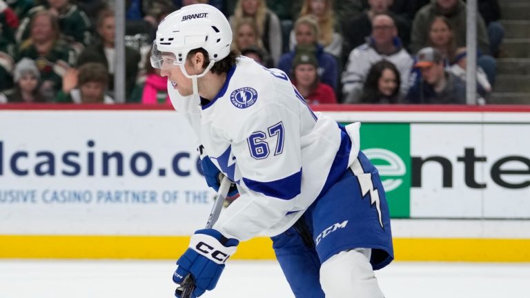 Tampa Bay Lightning defenseman Declan Carlile skates with the puck during the second period of his NHL debut. Thursday, Jan. 4, 2024 (AP Photo/Abbie Parr)