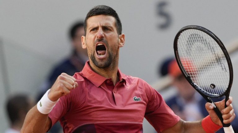 Serbia's Novak Djokovic clenches his fist after holding his service game and reaching 5-5 in the fourth set during his fourth round match of the French Open tennis tournament against Argentina's Francisco Cerundolo at the Roland Garros stadium in Paris, Monday, June 3, 2024. (AP/Thibault Camus)