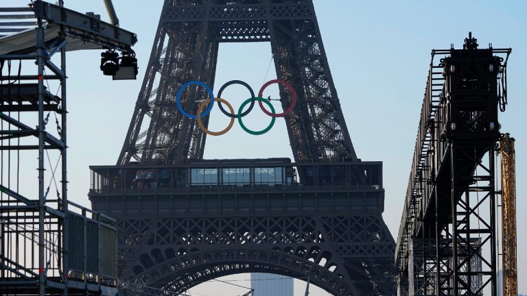 The Olympic rings are seen on the Eiffel Tower, marking 50 days until the start of the Summer Games, June 7, 2024 in Paris. (Michel Euler/AP)