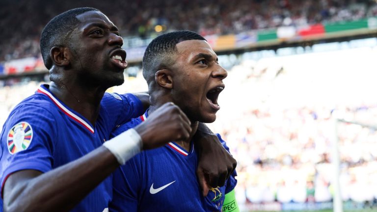 Kylian Mbappe celebrates after scoring a penalty kick during a Group D match between the France and Poland at the Euro 2024 soccer tournament in Dortmund, Germany, Tuesday, June 25, 2024. (Friso Gentsch/dpa via AP)