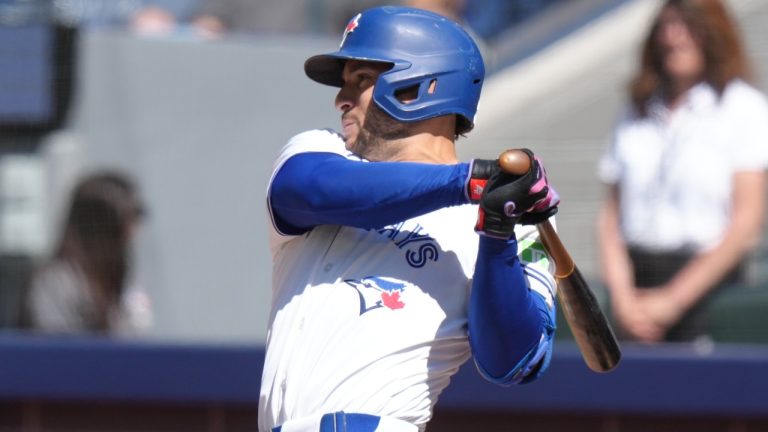 Toronto Blue Jays outfielder George Springer (4) hits a single against the Cleveland Guardians during second inning MLB baseball action in Toronto on Saturday, June 15, 2024. THE CANADIAN PRESS/Chris Young