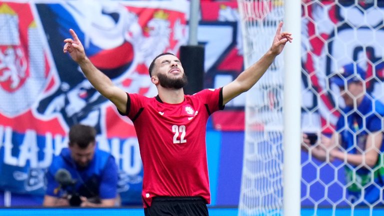 Georgia's Georges Mikautadze celebrates after scoring the opening goal during a match against Czech Republic at the Euro 2024 tournament, June 22, 2024. (AP Photo/Petr David Josek)