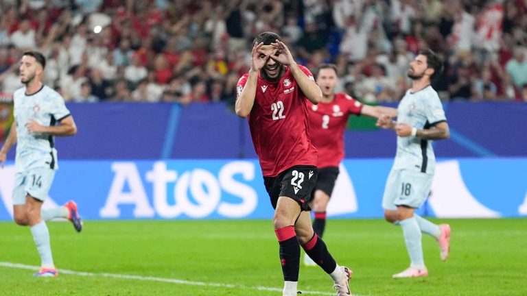 Georgia's Georges Mikautadze celebrates after scoring on a penalty kick during a Group F match between Georgia and Portugal at the Euro 2024 soccer tournament in Gelsenkirchen, Germany, Wednesday, June 26, 2024. (Martin Meissner/AP)