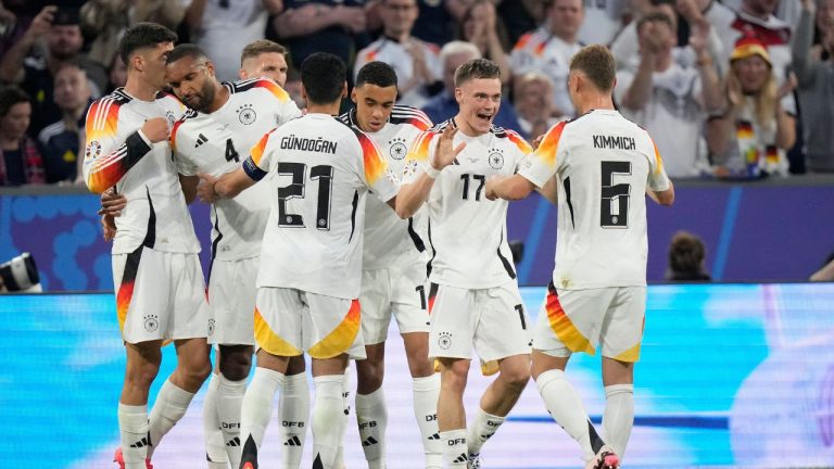 Germany's Florian Wirtz celebrates after scoring his side's opening goal during a Group A match between Germany and Scotland at the Euro 2024 soccer tournament in Munich, Germany, Friday, June 14, 2024. (Matthias Schrader/AP Photo)