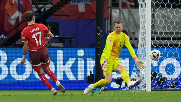 Switzerland's Ruben Vargas scores a goal that was then disallowed for offside during a Group A match between Switzerland and Germany at the Euro 2024 soccer tournament in Frankfurt, Germany, Sunday, June 23, 2024. (AP Photo/Frank Augstein)