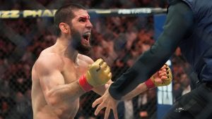 Russia's Islam Makhachev celebrates after defeating Dustin Poirier in a lightweight title bout at the UFC 302 mixed martial arts event early Sunday, June 2, 2024, in Newark, N.J. (Frank Franklin II/AP Photo)