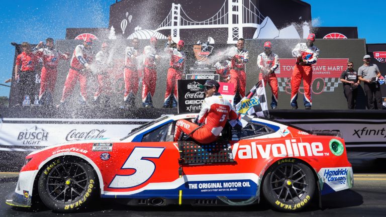 Kyle Larson (5) celebrates with his team after winning a NASCAR Cup Series auto race at Sonoma Raceway, Sunday, June 9, 2024, in Sonoma, Calif. (Godofredo A. Vásquez/AP)