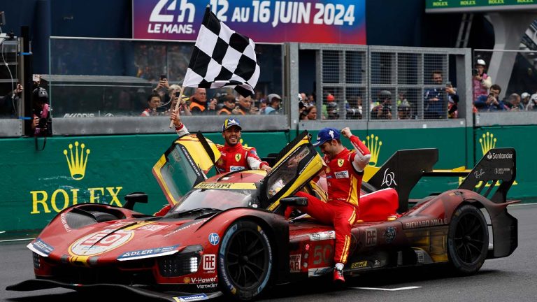 Spanish driver Miguel Molina, right, Italian driver Antonio Fuoco, left, and Danish driver Nicklas Nielsen, driving the car, a Ferrari 499P Hybrid Hypercar of WEC's team, celebrate after winning Le 24 Hours of Le Mans sports-car race Sunday, June 16, 2024, in Le Mans, France. (Jeremias Gonzalez/AP)