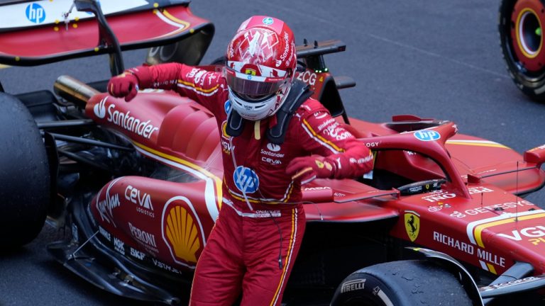 Ferrari driver Charles Leclerc of Monaco celebrates after winning the Formula One Monaco Grand Prix race at the Monaco racetrack. (Luca Bruno/AP)