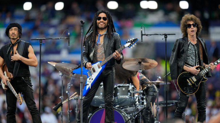 Lenny Kravitz performs ahead of the the Champions League final soccer match between Borussia Dortmund and Real Madrid at Wembley stadium in London, Saturday, June 1, 2024. (AP Photo/Kirsty Wigglesworth)