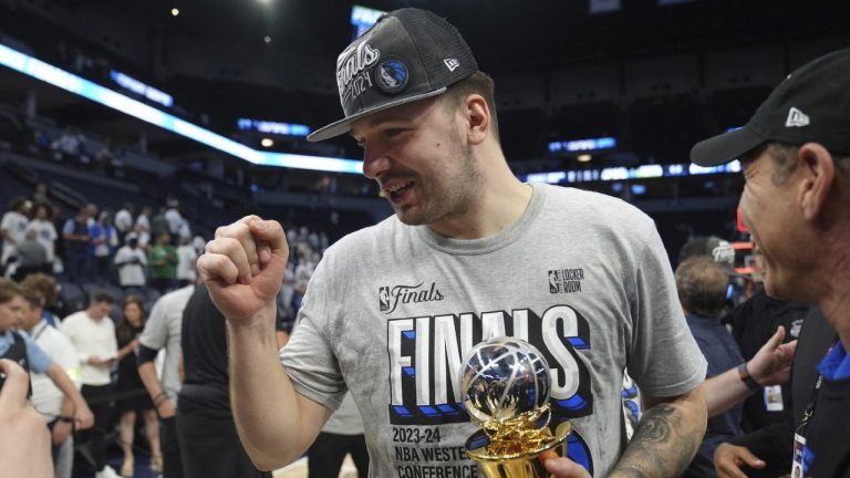 Dallas Mavericks guard Luka Doncic celebrates the team's win over the Minnesota Timberwolves in Game 5 of the Western Conference finals in the NBA basketball playoffs Thursday, May 30, 2024, in Minneapolis. (Abbie Parr/AP)