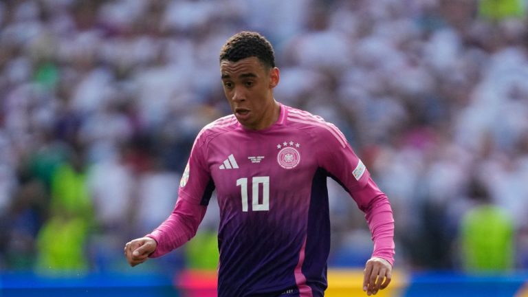 Germany's Jamal Musiala controls the ball during a Group A match between Germany and Hungary at the Euro 2024 soccer tournament in Stuttgart, Germany, Wednesday, June 19, 2024. (Darko Vojinovic/AP)