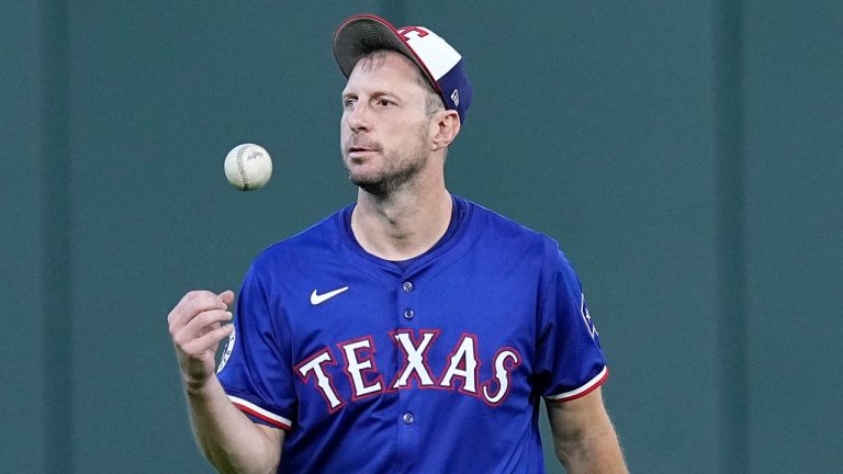 Texas Rangers' Max Scherzer walks off the field after working out before a game against the Houston Astros, April 12, 2024. (AP Photo/Kevin M. Cox)