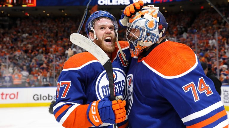 Connor McDavid and Stuart Skinner of the Edmonton Oilers. (Codie McLachlan/Getty Images)