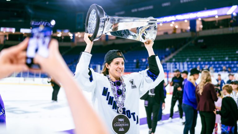 PWHL Minnesota forward Michela Cava raises the Walter Cup. (Photo courtesy of the PWHL)