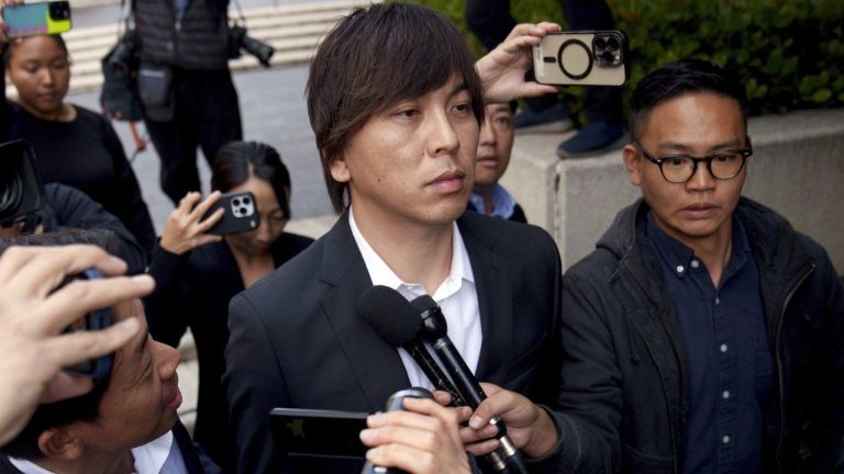 Ippei Mizuhara, centre, the former longtime interpreter for the Los Angeles Dodgers baseball star Shohei Ohtani, leaves federal court following his arraignment, Tuesday, May 14, 2024, in Los Angeles. Mizuhara is scheduled to plead guilty Tuesday, June 4, 2024, to bank and tax fraud in a sports betting case where he is expected to admit to stealing nearly $17 million from the Japanese baseball player. (Eric Thayer/AP)