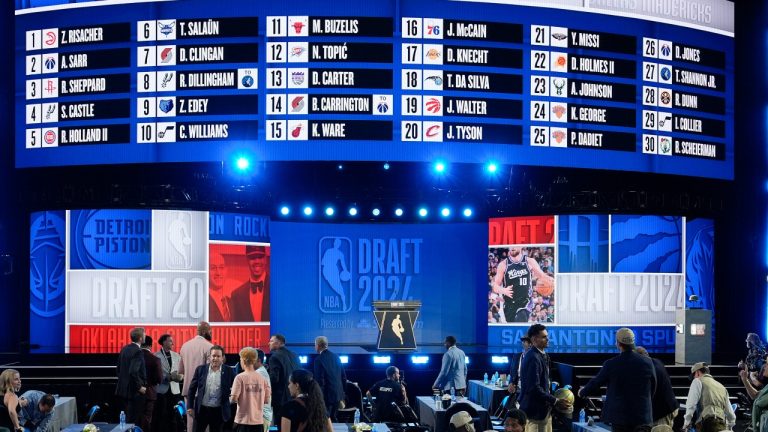 Names of all 30 first round picks fill the NBA draft board at the end of the first round, June 26, 2024. (AP Photo/Julia Nikhinson)