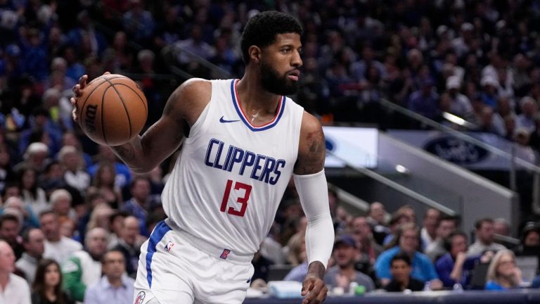 Los Angeles Clippers' Paul George works against the Dallas Mavericks in Game 2 of an NBA basketball first-round playoff series in Dallas, Friday, April 26, 2024. (Tony Gutierrez/AP Photo)