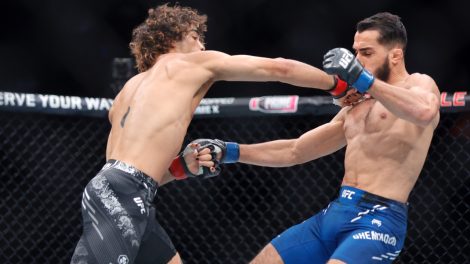 Payton-Talbott-knocks-down-Yanis-Ghemmouri-in-the-first-round-of-a-bantamweight-bout-during-UFC-303