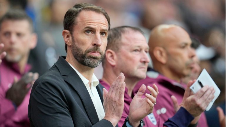 England's head coach Gareth Southgate applauds before the start of the International friendly soccer match between England and Iceland at Wembley stadium in London, Friday, June 7, 2024.(Kin Cheung/AP)