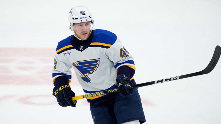 St. Louis Blues defenseman Scott Perunovich works against the Dallas Stars during an NHL hockey game in Dallas, Wednesday, April 17, 2024. (Tony Gutierrez/AP)