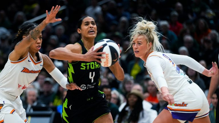 Seattle Storm guard Skylar Diggins-Smith (4) drives to the basket between Phoenix Mercury guard Sug Sutton, left, and guard Sophie Cunningham during the first half of a WNBA basketball game Tuesday, June 4, 2024, in Seattle. (Lindsey Wasson/AP)