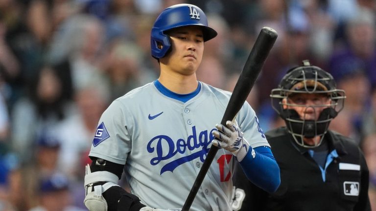 Los Angeles Dodgers' Shohei Ohtani steps up to the plate in the sixth inning against the Colorado Rockies, June 19, 2024. (AP Photo/David Zalubowski)
