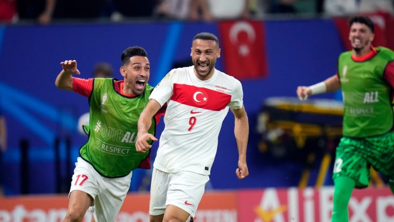 Turkey's Cenk Tosun celebrates after scoring his side's second goal during a match against Czech Republic at the Euro 2024 tournament, June 26, 2024. (AP Photo/Petr David Josek)