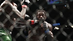 Jared Cannonier, right, fighting Israel Adesanya in a middleweight title bout during UFC 276 on July 2, 2022 in Las Vegas. (John Locher/AP)