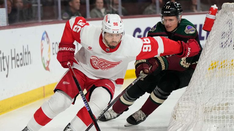 Detroit Red Wings defenseman Jake Walman (96) skates away from Arizona Coyotes center Nick Bjugstad (17) in the first period during an NHL hockey game, Friday, March 8, 2024, in Tempe, Ariz. The San Jose Sharks acquired defenseman Jake Walman and a second-round pick from Detroit in exchange for future considerations. San Jose added the 53rd overall pick that was originally held by Tampa Bay and inherited the final two years of Walman's contract that carry a $3.4 million cap hit each season in the deal announced on Tuesday, June 25, 2024. (Rick Scuteri/AP)