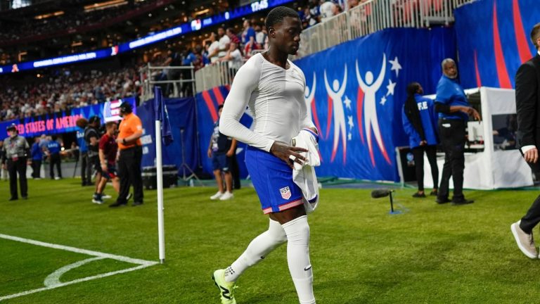 Tim Weah of the United States leaves the field after receiving a red card during a Copa America Group C soccer match against Panama in Atlanta, Thursday, June 27, 2024. (Mike Stewart/AP Photo)