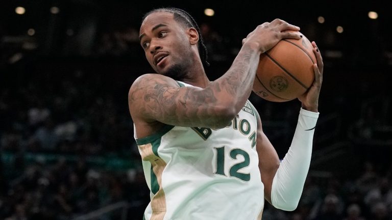 Boston Celtics forward Oshae Brissett (12) during an NBA basketball game, Sunday, April 7, 2024, in Boston. (Charles Krupa/AP)