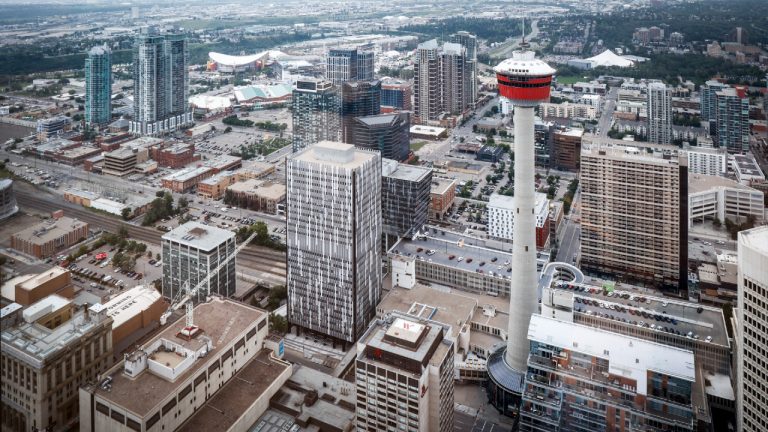 A view of the Calgary Tower and the Calgary Stampede grounds seen from the Telus Sky building in Calgary, Alta., Wednesday, July 6, 2022. (Jeff McIntosh/CP)