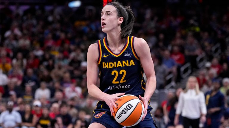 Indiana Fever guard Caitlin Clark (22) plays against the Los Angeles Sparks in the first half of a WNBA basketball game in Indianapolis, Tuesday, May 28, 2024. (Michael Conroy/AP)