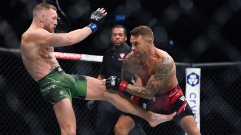 Conor-McGregor,-left,-kicks-Dustin-Poirier-during-their-UFC-264-lightweight-mixed-martial-arts-bout-in-Las-Vegas-in-2021