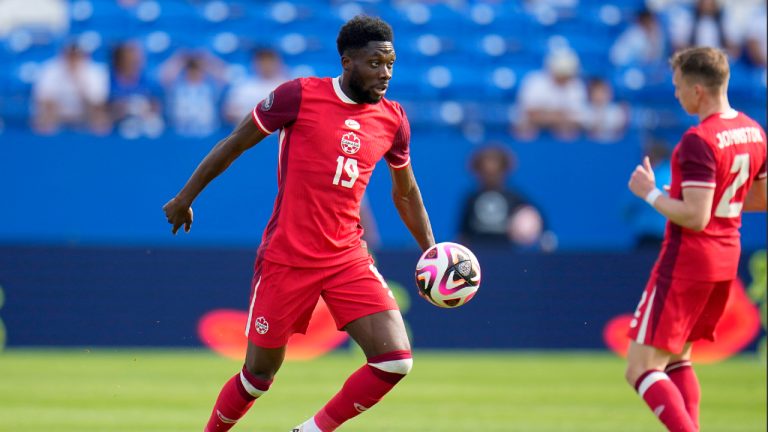 Canada forward Alphonso Davies (19) positions to shoot in the second half of a CONCACAF Nations League Play-In soccer match against Trinidad And Tobago, Saturday, March 23, 2024, in Frisco, Texas. (Julio Cortez/AP)