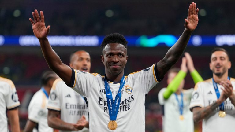 Real Madrid's Vinicius Junior waves after winning the Champions League final soccer match between Borussia Dortmund and Real Madrid at Wembley stadium in London, Saturday, June 1, 2024. (Kirsty Wigglesworth/AP)