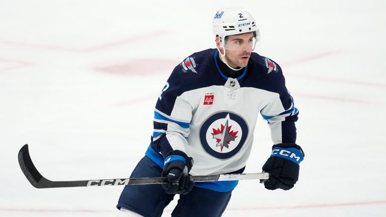 Winnipeg Jets defenceman Dylan DeMelo competes against the Dallas Stars during an NHL hockey game in Dallas, Thursday, April 11, 2024. (Tony Gutierrez/AP)