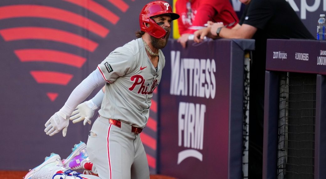 Phillies’ Harper does soccer slide after home run against Mets in London