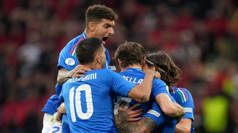 Italian players celebrate after Italy's Nicolo Barella scored his side's second goal during the Group B match between Italy and Albania at the Euro 2024 soccer tournament in Dortmund, Germany, Saturday, June 15, 2024. (Martin Meissner/AP)