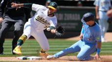 Blue Jays give Oakland wild send-off with important extra-innings victory