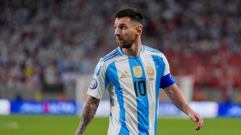 Argentina's Lionel Messi walks to take a corner kick during a Copa America Group A soccer match against Chile in East Rutherford, N.J., Tuesday, June 25, 2024. (Julia Nikhinson/AP)