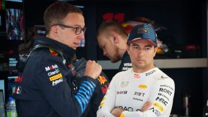 Red Bull Racing driver Sergio Perez of Mexico listens to a team member during the first practice session at the Canadian Grand Prix Friday, June 7, 2024 in Montreal. (Paul Chiasson/CP)