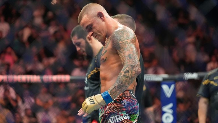 Dustin Poirier reacts after a lightweight title bout against Russia's Islam Makhachev at the UFC 302 mixed martial arts event Sunday, June 2, 2024, in Newark, N.J. (Frank Franklin II/AP Photo)